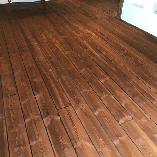 Furugolv pigmenterat